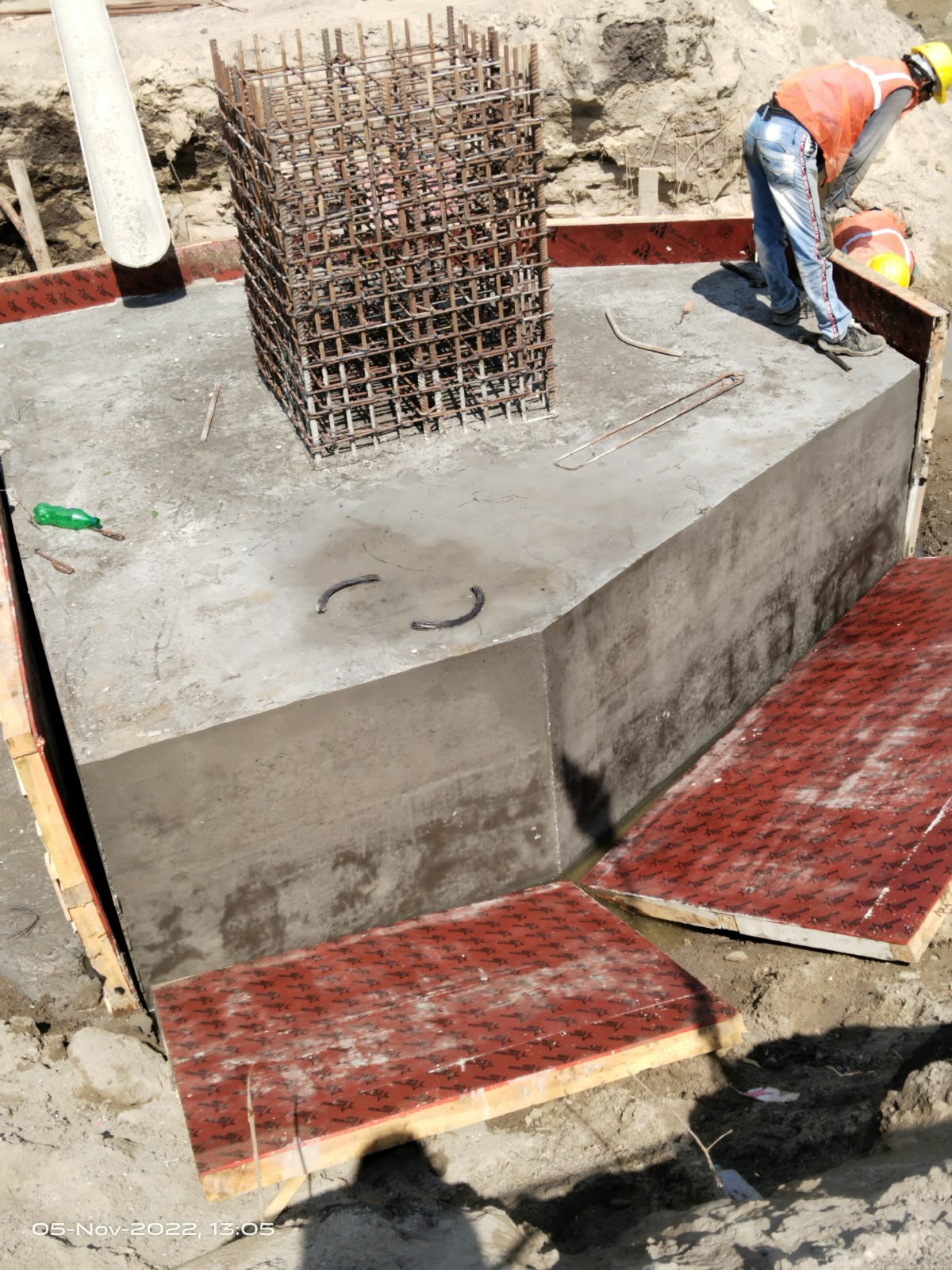 Concrete pedestal with a column reinforcement cage after formwork is opened